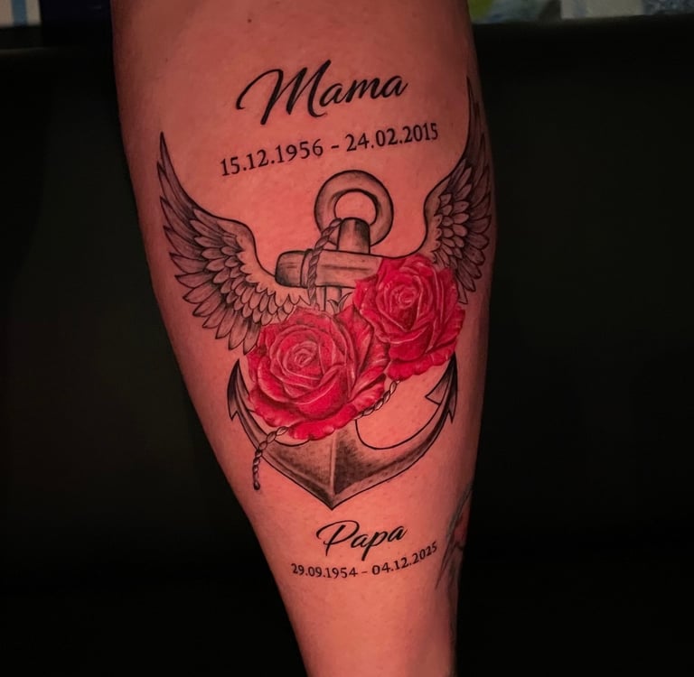 Memorial tattoo on lower leg with winged anchor and red roses, Hurghada tattoo studio”