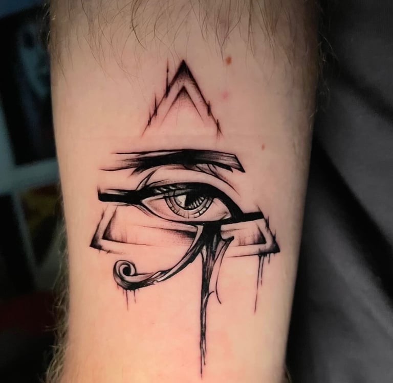 Eye of Horus tattoo in blackwork on forearm — Hurghada Tattoo Studio
