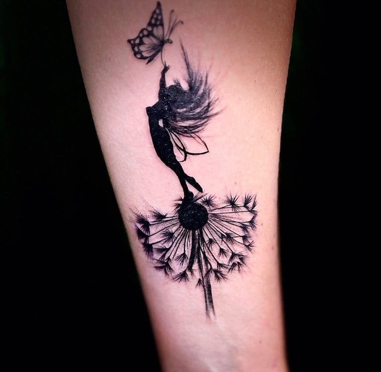 Feather tattoo in fine line on forearm — Hurghada Tattoo Studio