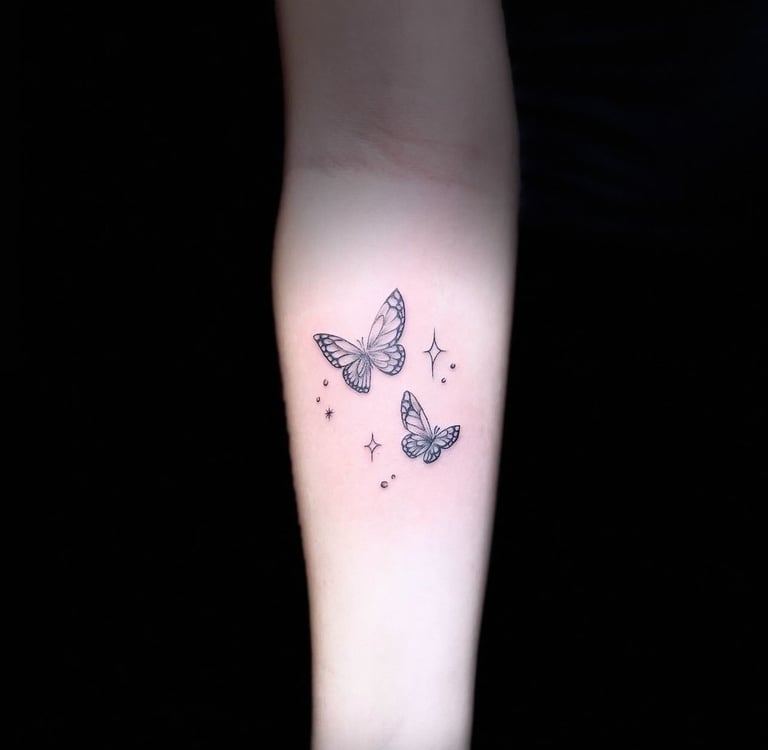 Fine line butterfly tattoo on wrist — Hurghada Tattoo Studio