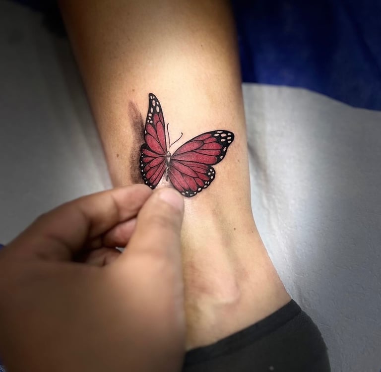 3D butterfly tattoo on shoulder — Hurghada Tattoo Studio