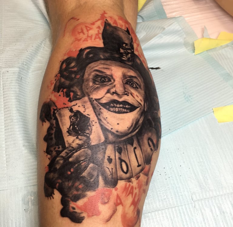 Black and grey skull tattoo on upper arm — Hurghada Tattoo Studio