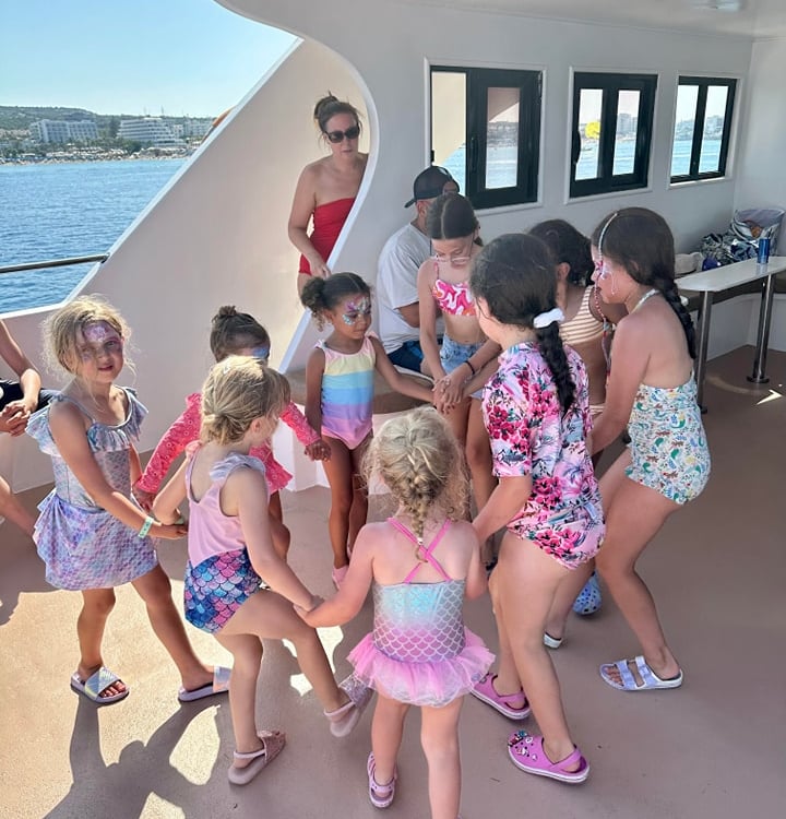 Children taking part in activities on a family boat tour in Cyprus