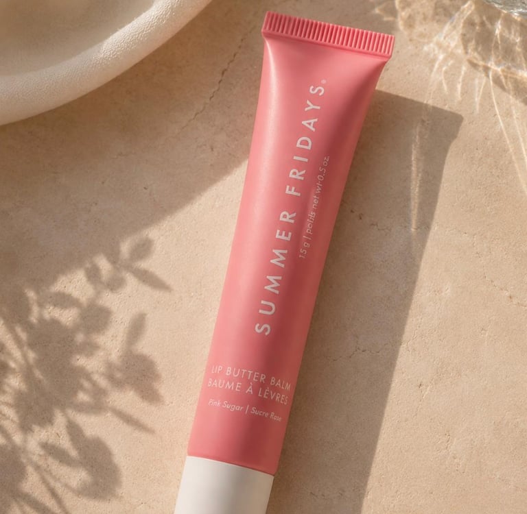 Summer Fridays Lip Butter Balm Pink Sugar on a beige stone surface