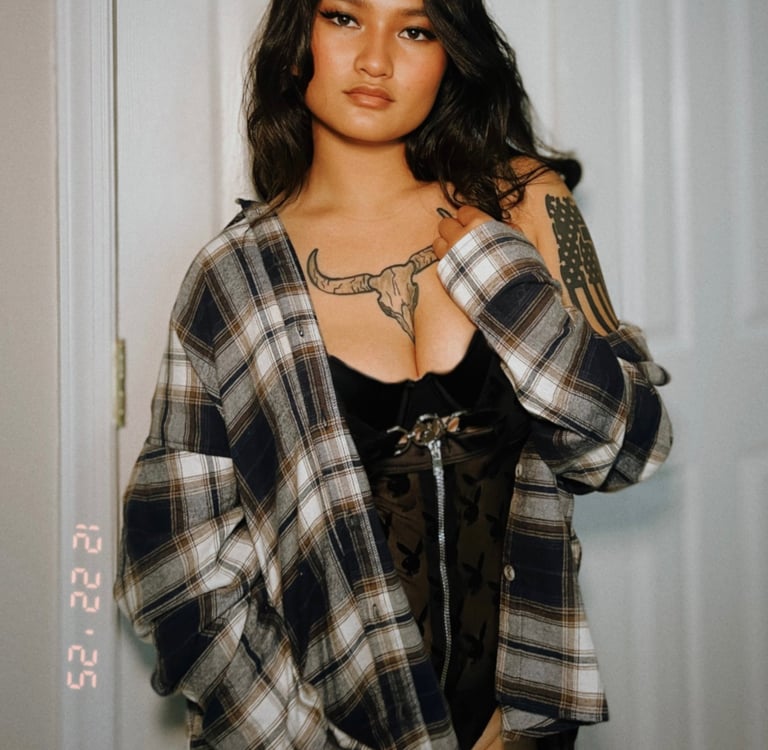 Amelia in a flannel and lace top