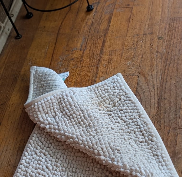 why a crooked rug drives me crazy