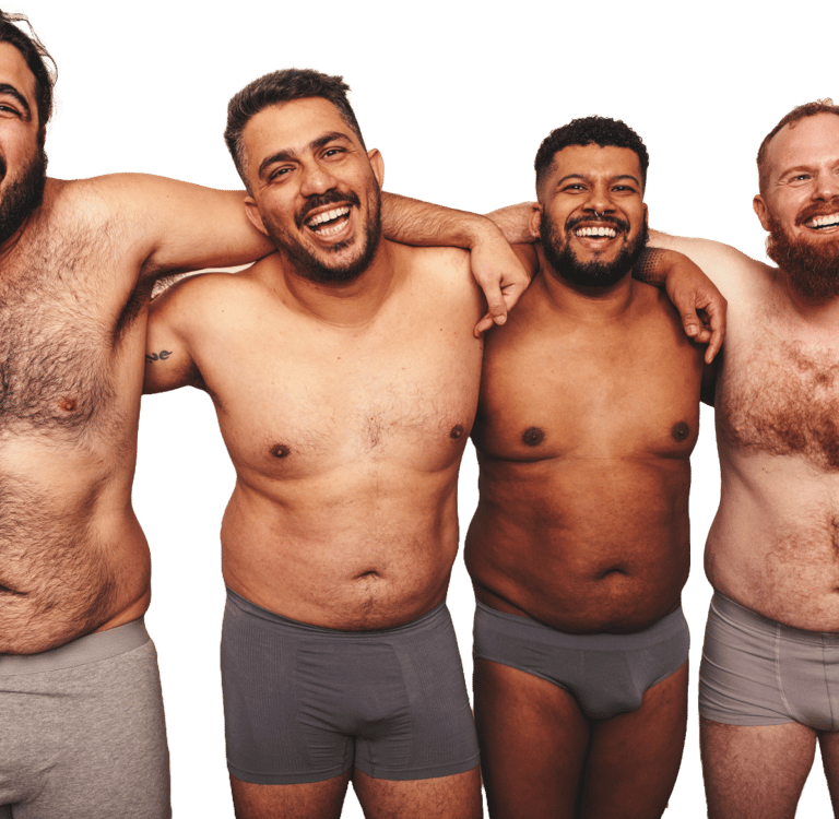 4 shirtless men of different skin tones and sizes with their arms on each other's shoulders