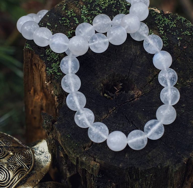 two bracelets on a stone