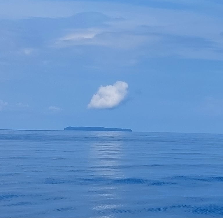 Cano Island seen from distance in a tour with Coral Expeditions Costa Rica 
