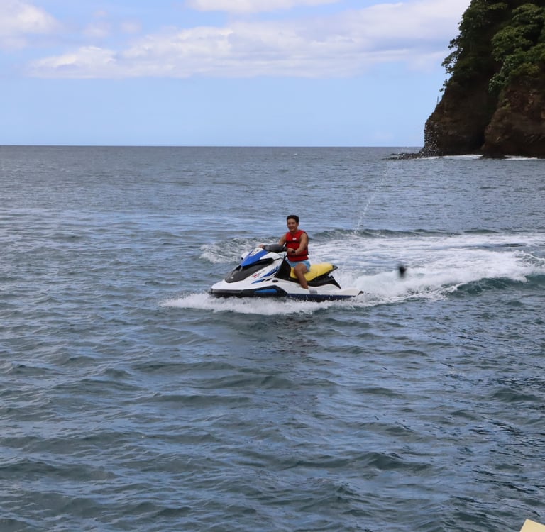 Riding jet ski during private tour in Papagayo Gulf, Costa Rica