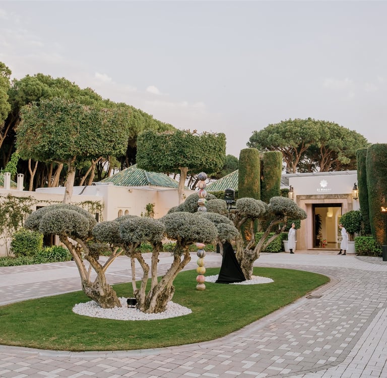 Elegant corporate event entrance at Villa El Rincon Marbella with landscaped gardens