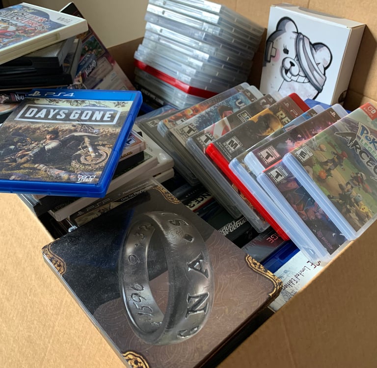 Backlog box full of video games.