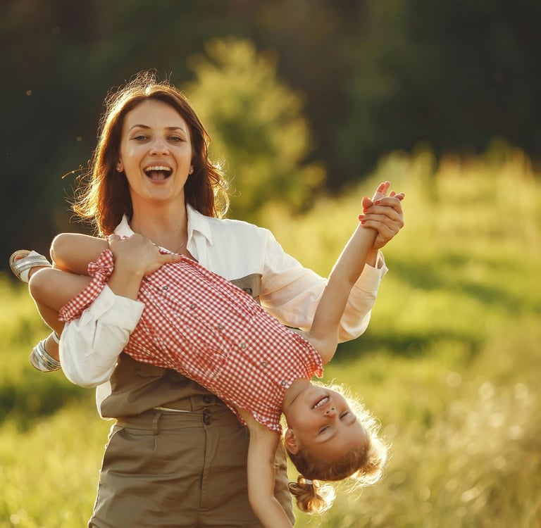 happy mom and child playing together