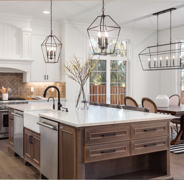 a kitchen with a table and chairs and a table