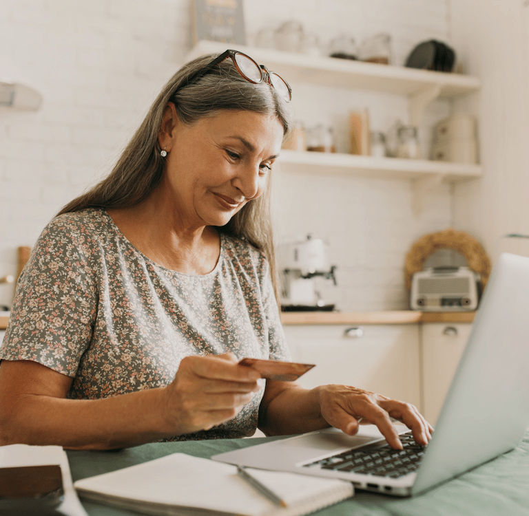 FERS_LADY_LOOKS_AT_SS_CARD