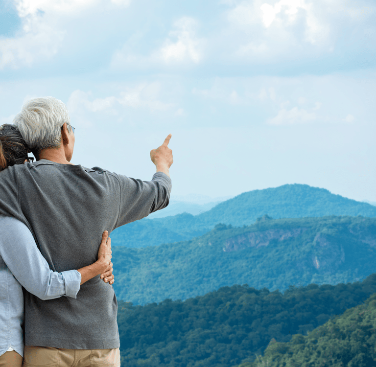 FERS Employees ponder a mountain landscape