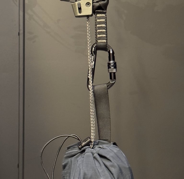 Tactical rope bag attached for controlled rope deployment