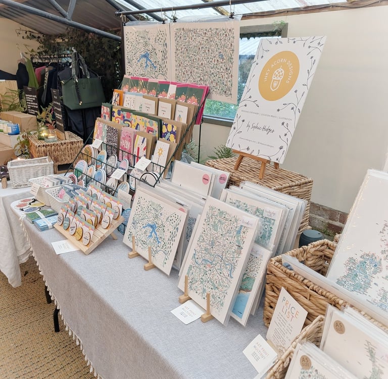 A selection of Inky Acorn Designs illustrated map prints. London map and Bewl Map