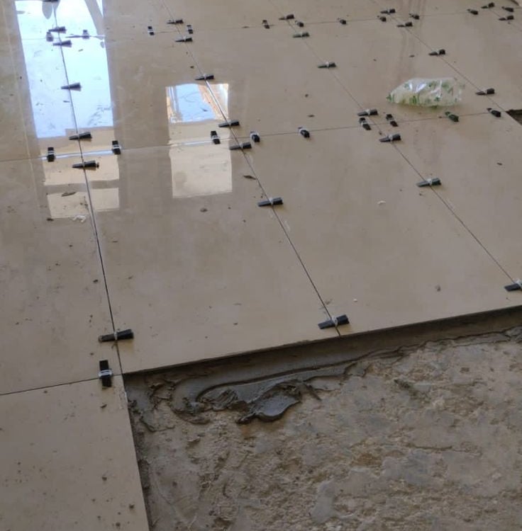 Flawless precision tiles leveling and heavy-duty GVT tiles fitting by expert contractor in Boisar.