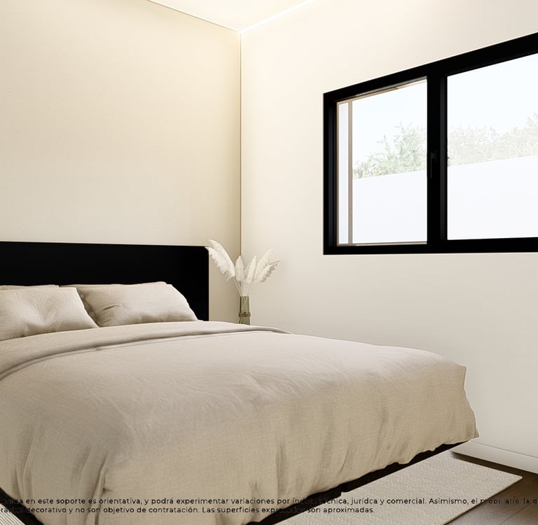 a bed with a bed and a table with a lamp