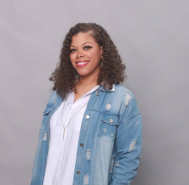Picture of a woman against a grey background