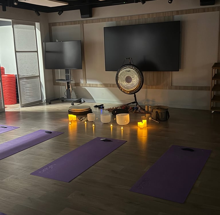 a corporate sound bath set up in an office gym