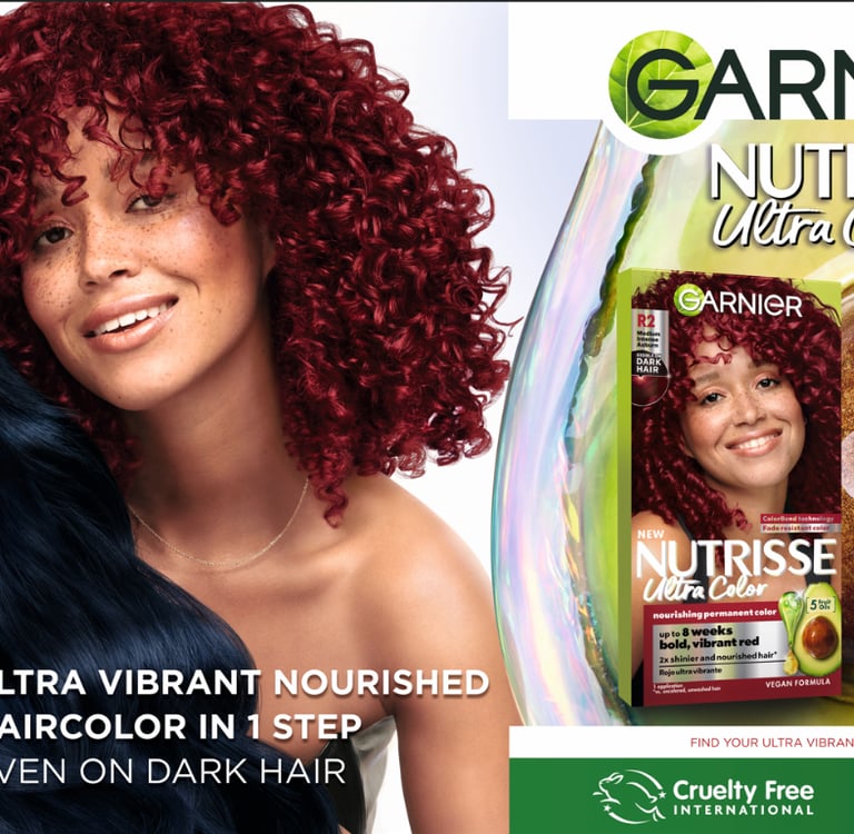Garnier Nutrisse Ultra Color hair dye advertisement featuring vibrant red and dark blue permanent hair colors.