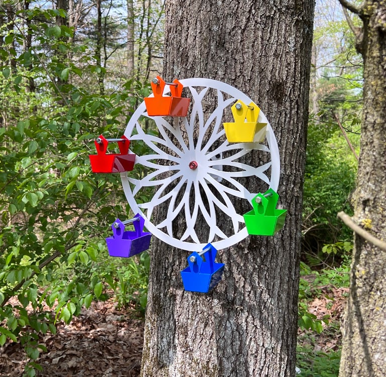 Whirly Wheel Bird Feeder Mounted on Tree