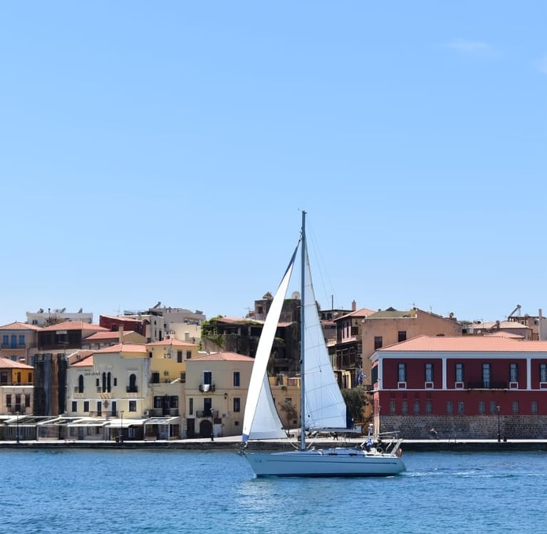a sailboat in the water in the chania port
