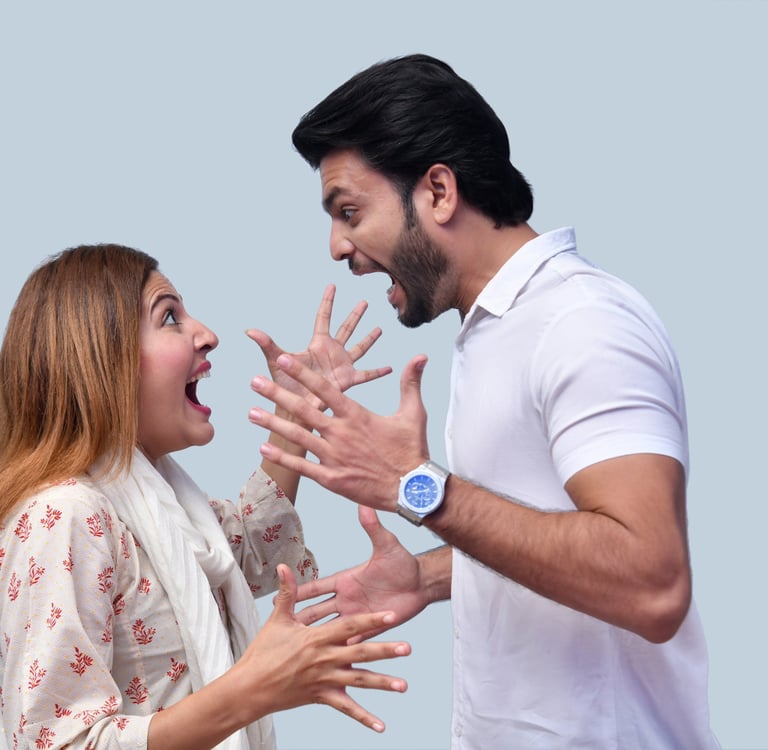 Couple experiencing intense conflict during a moment of anger, highlighting the need for anger manag