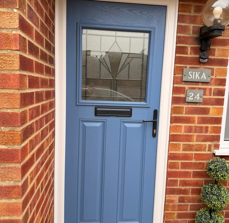 Pigeon Blue Composite Door Installed Near Hythe, Southampton - blue capri 1 composite front door with black hardware