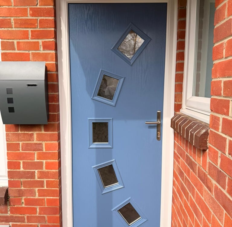 Pigeon blue front door with 5 glass panels in an arch fitted in Stubbington, Hampshire.