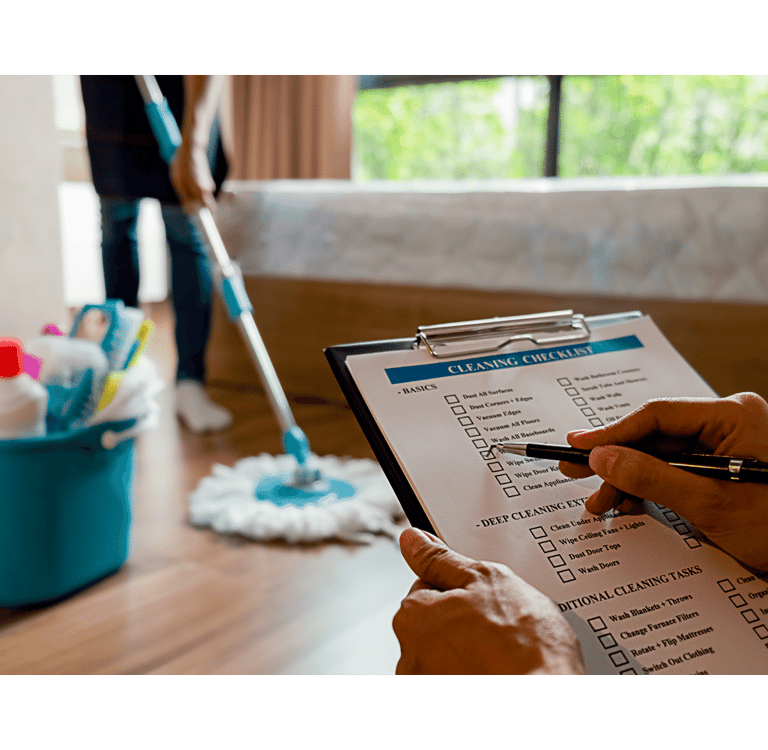 a person holding a clipboard with a clipboard and a pen