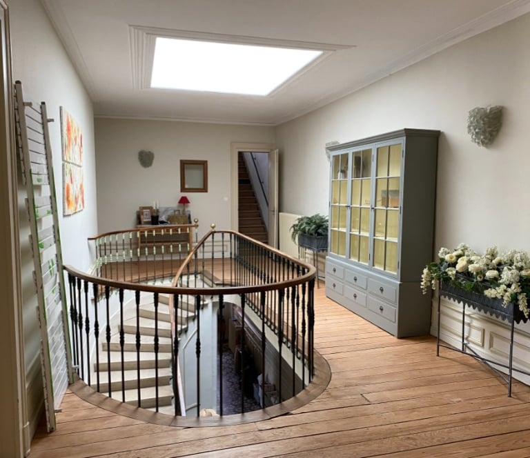 Die prächtige Innentreppe des Maison de Maître, Herrenhaus