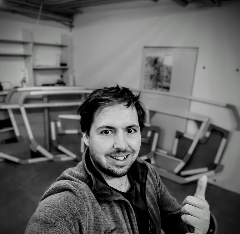 Portrait of Fabian Schmid Frames of Class GLobe 5.80 , Hull # 208 in the Background