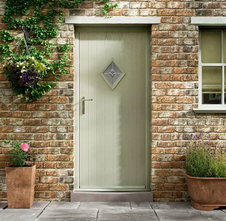 a pale green small composite door 