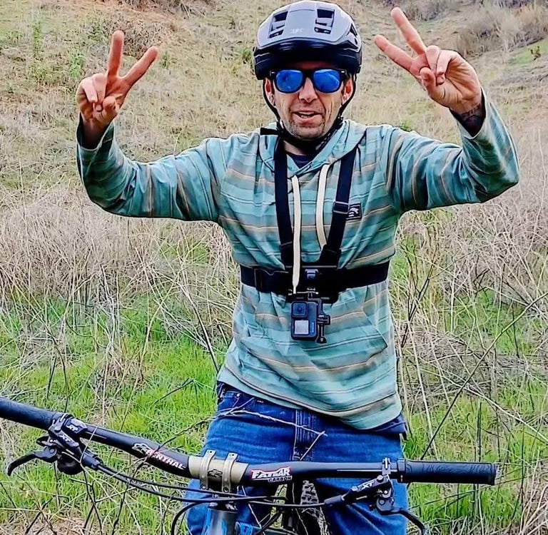 mountain biker wearing sunglasses for eye protection