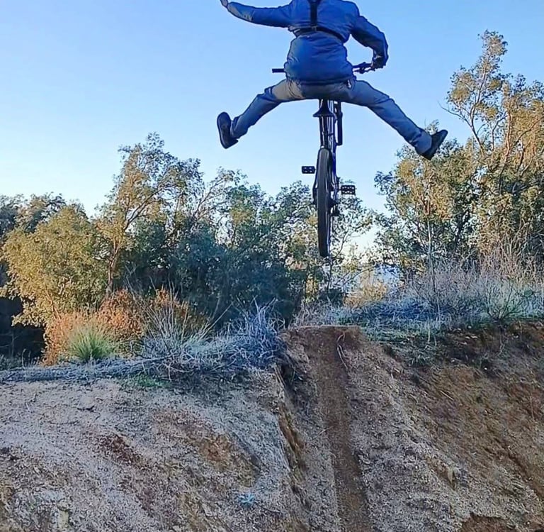 mountain biker doing a no footer