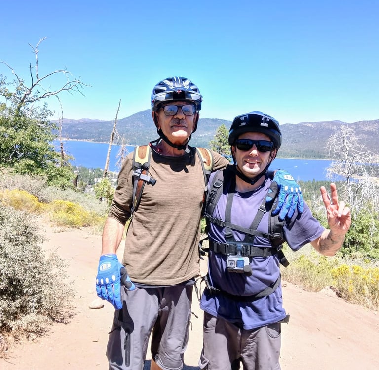 dad and son out mountain biking wearing same mtb shorts