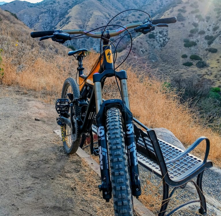 Specialized mountain bike with Fox Factory 36 forks and aggressive MTB tires at Hulda Crooks Park in