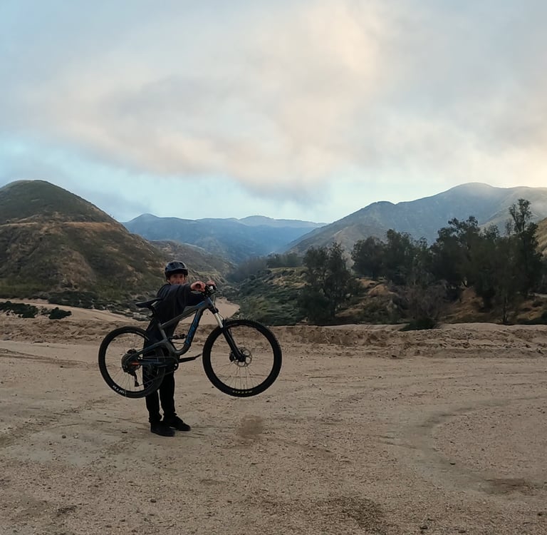 Practice bunnyhop by standing next to bike and lifting front wheel then rear wheel