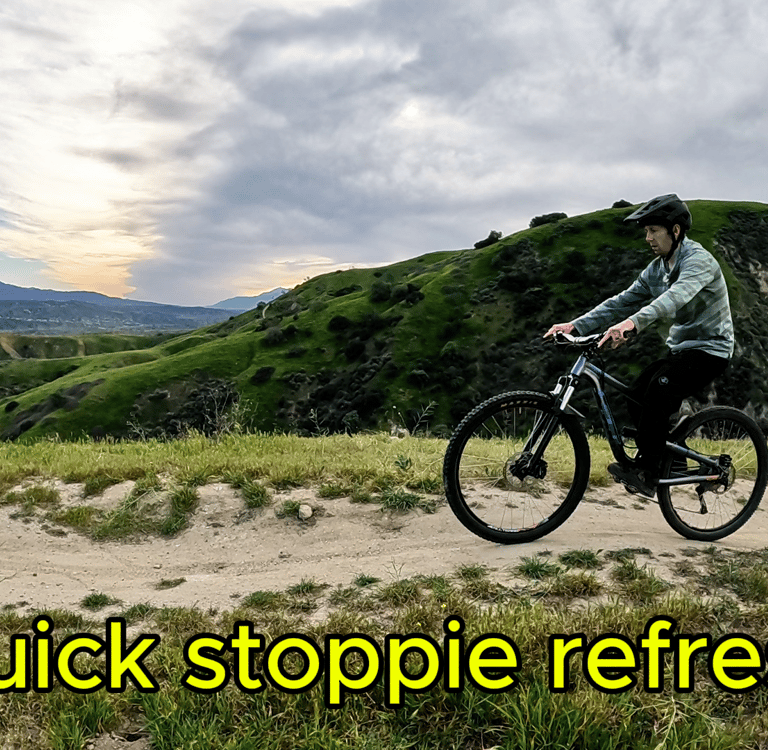 Mountain biker about to do a stoppie