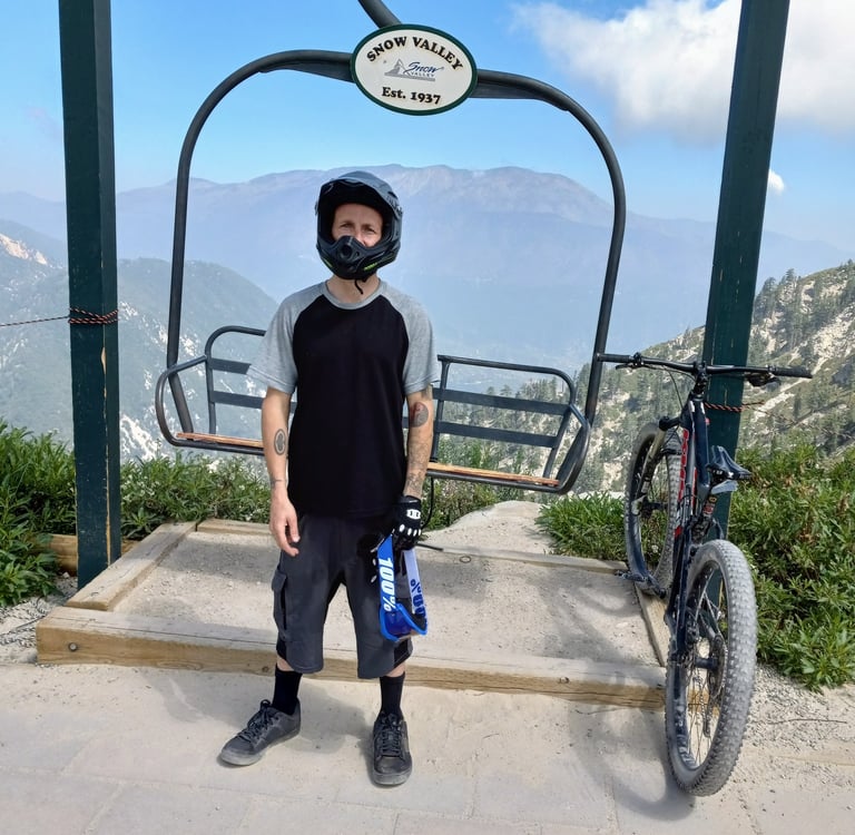mountain biker at top of ski resort