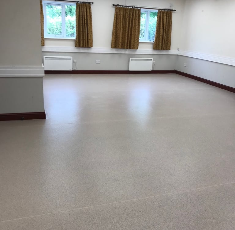 a room with a large window and a large window