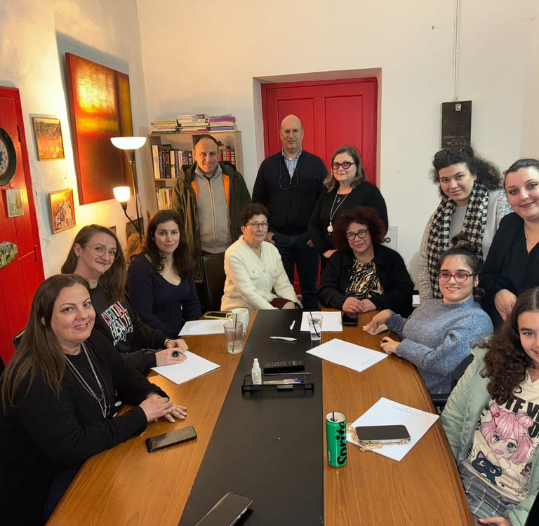 a group of people sitting around a table