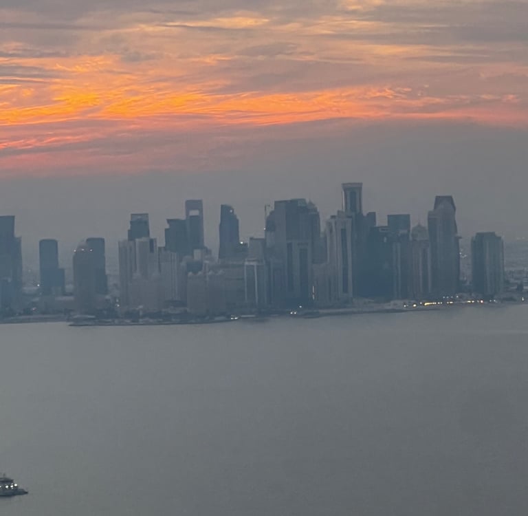 Sky line view of Doha, Qatar at sunset