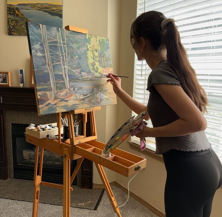 Angela Moiseieva at work on Nature’s Whisper 18 × 24 inches, an original forest oil painting