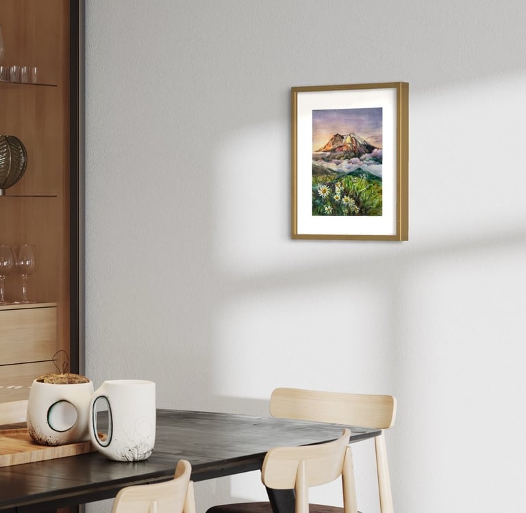 Angela Moiseieva original painting 'Sun-Kissed Peaks' above a dining table.