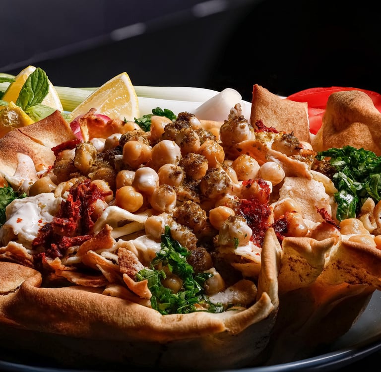 PhotoHome food photography: close-up of traditional Syrian chickpea fatteh dish.