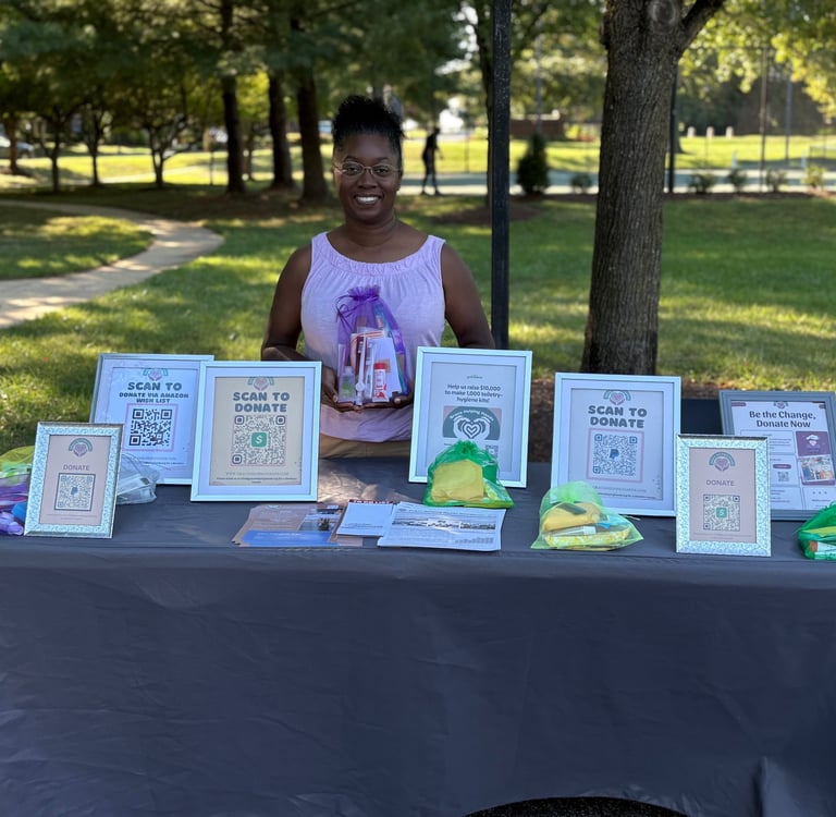 a woman standing behind a table with a table with a table cloth